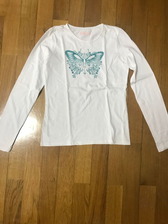 Camiseta blanca con mariposa talla 12 años