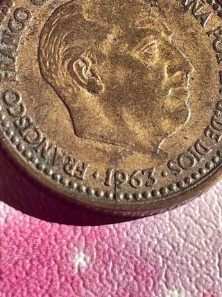 1 peseta Franco 1963 con errores leer