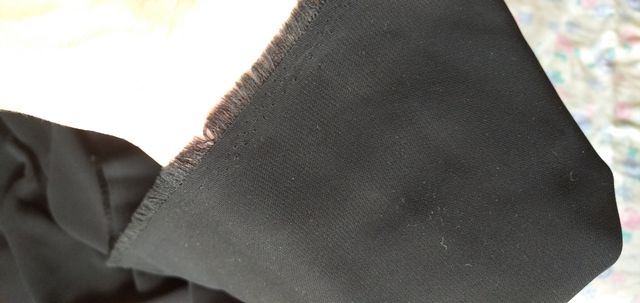 Retal tela crepe confección en negro