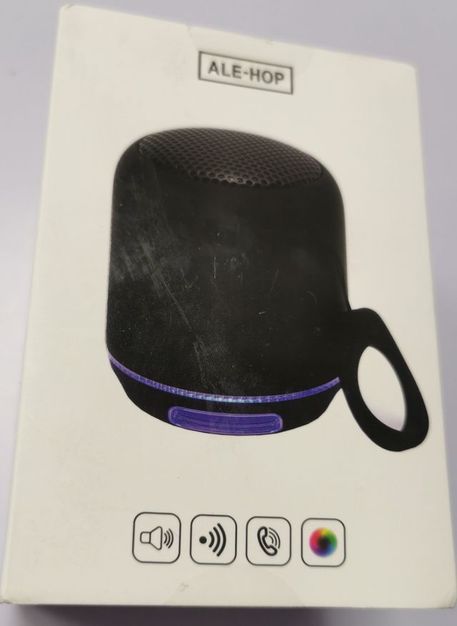 Altavoz redondo con luz led.