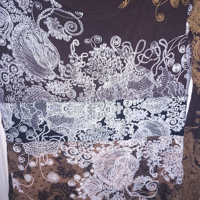 VESTIDO DE DESIGUAL.