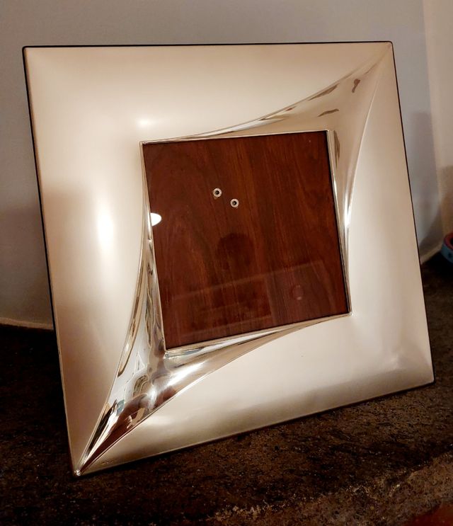 Cornice portafoto e specchio in argento