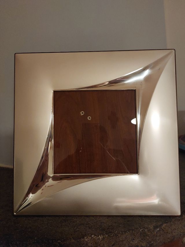 Cornice portafoto e specchio in argento