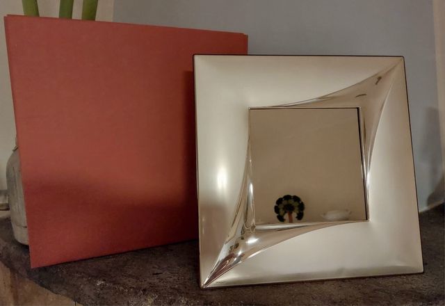 Cornice portafoto e specchio in argento