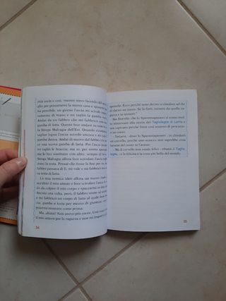 Libri per ragazze,  in regalo burattino