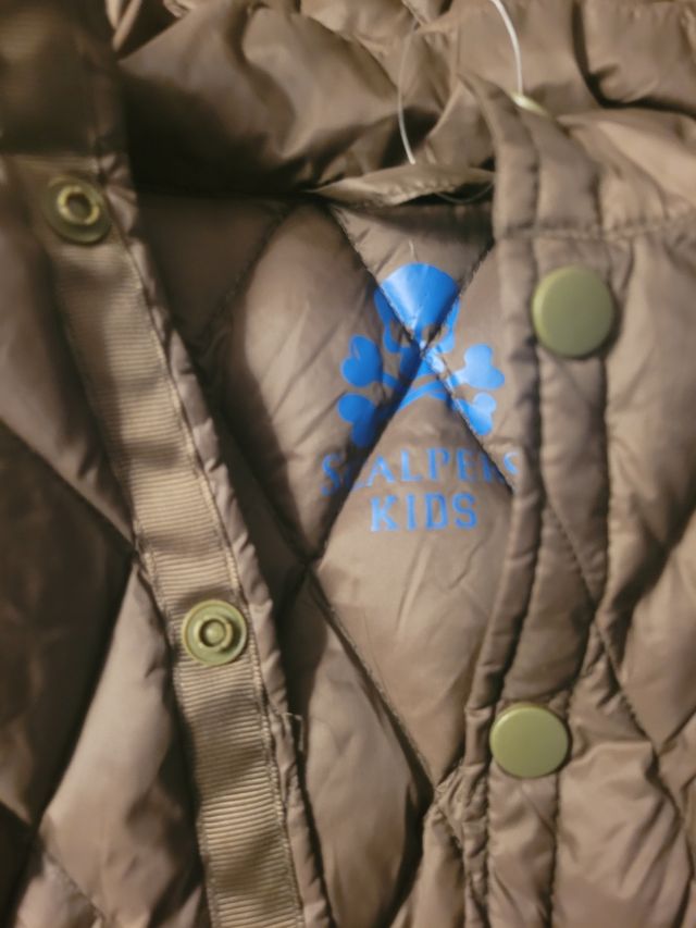 Plumas niño talla 8 Scalpers