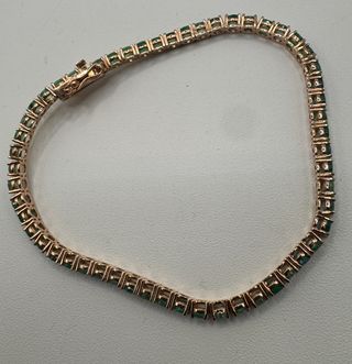 Pulsera riviere de oro de 18 kt con esmeraldas