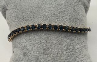 Pulsera riviere de oro de 18 kt con zafiros