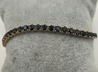 Pulsera riviere de oro de 18 kt con zafiros
