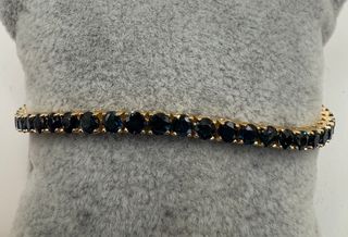 Pulsera riviere de oro de 18 kt con zafiros