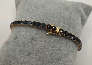 Pulsera riviere de oro de 18 kt con zafiros