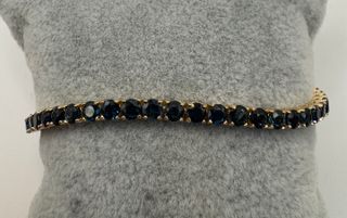 Pulsera riviere de oro de 18 kt con zafiros