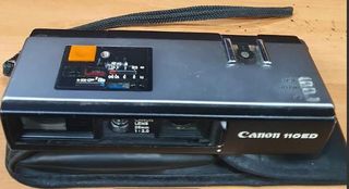 CANON 110ED,,CAMARA PLANA CON FUNDA NEGRA