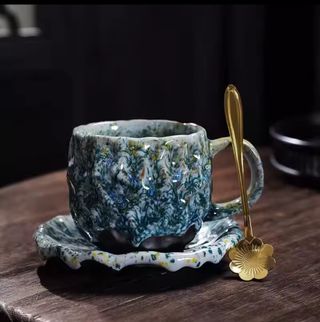 Juego de taza y plato de cerámica