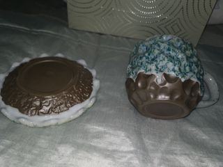 Juego de taza y plato de cerámica