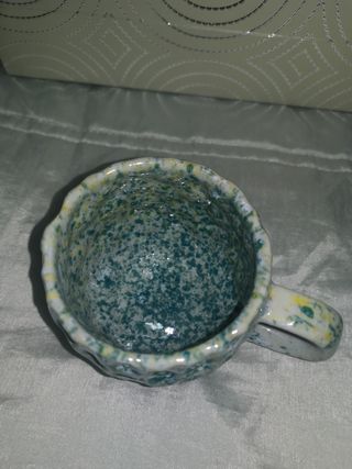 Juego de taza y plato de cerámica