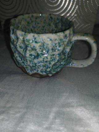 Juego de taza y plato de cerámica