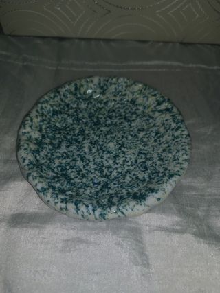 Juego de taza y plato de cerámica