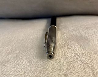 Bolígrafo chapado plata Cross USA y funda de piel