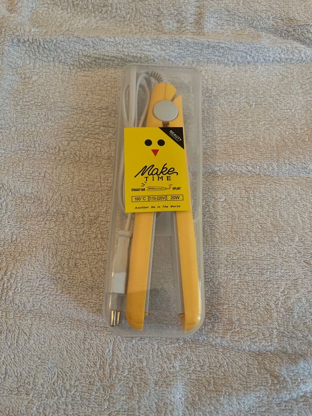 Mini piastra per capelli da viaggio