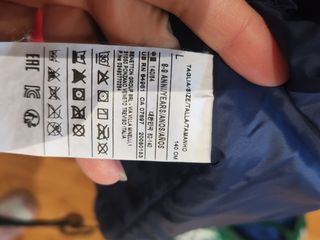 Plumas Benetton niño