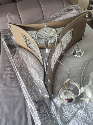 Lampadario in pelle e gocce di cristallo