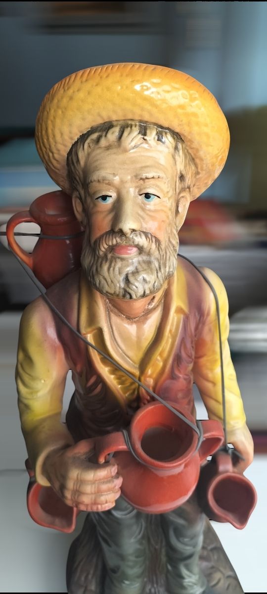 Jarrón anciano vendedor cantaros  ceramica