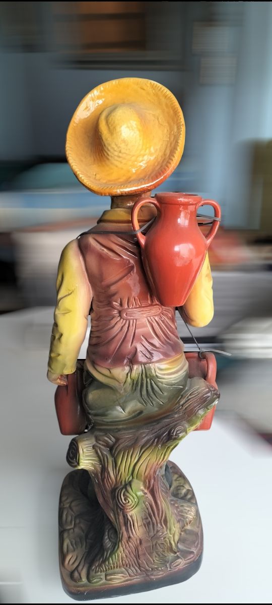 Jarrón anciano vendedor cantaros  ceramica