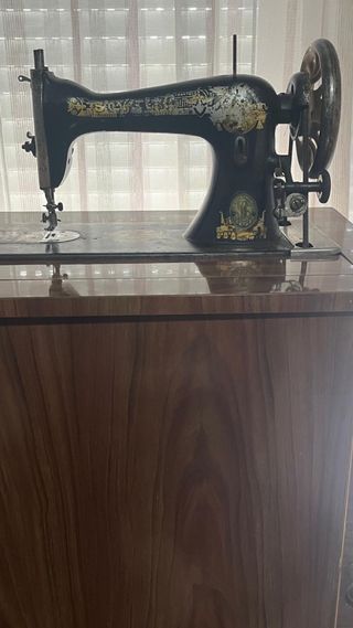 Maquina de coser singer con mueble