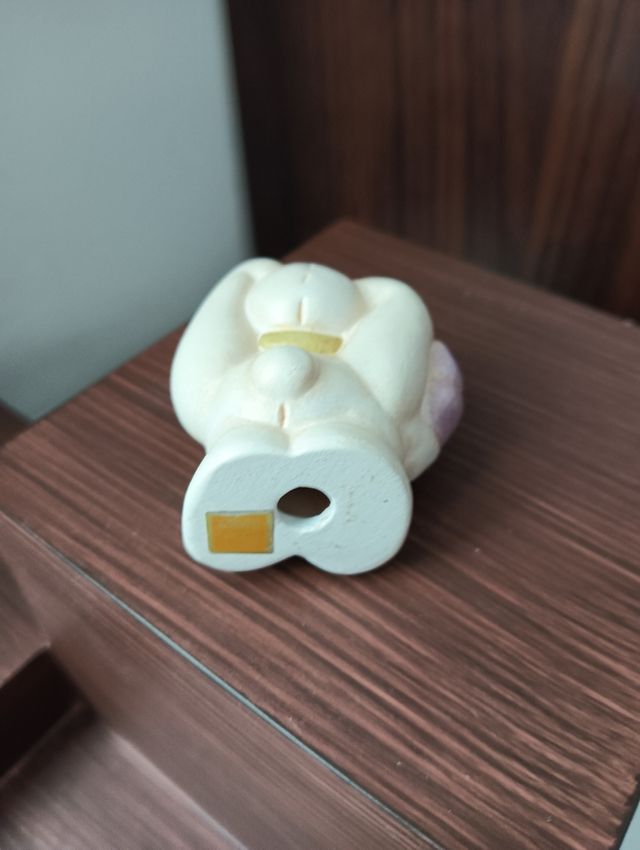 Coniglio di pezza con fiore Thun