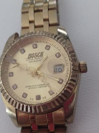 Reloj de hombre para piezas marca Bosck color dora