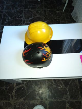 Cascos bicicleta niño y otro trabajo 