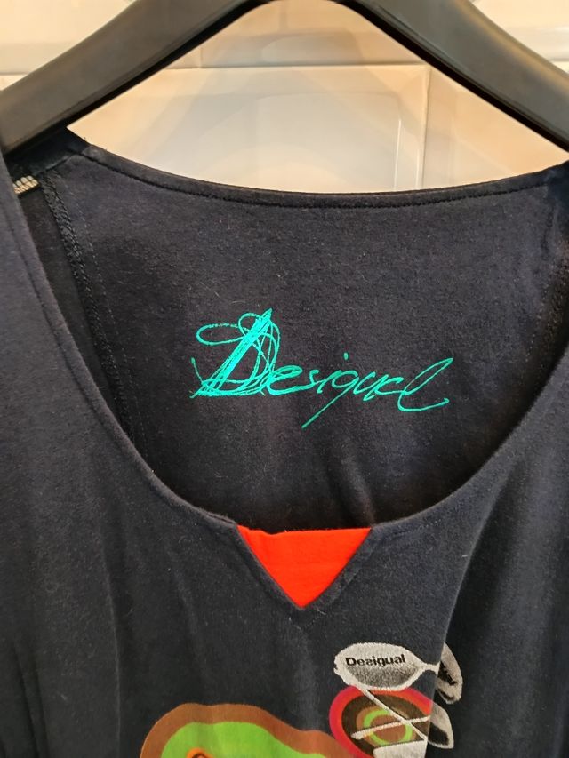 Vestido corto asimétrico desigual.Precio negociabl