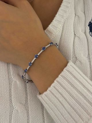 Pulsera Riviere de oro diamantes y zafiros