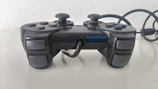 PlayStation 2  con lote de 8 juegos.