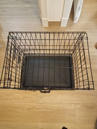 Jaula plegable con puerta