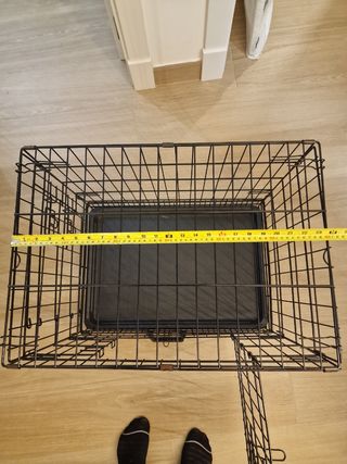Jaula plegable con puerta