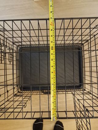 Jaula plegable con puerta
