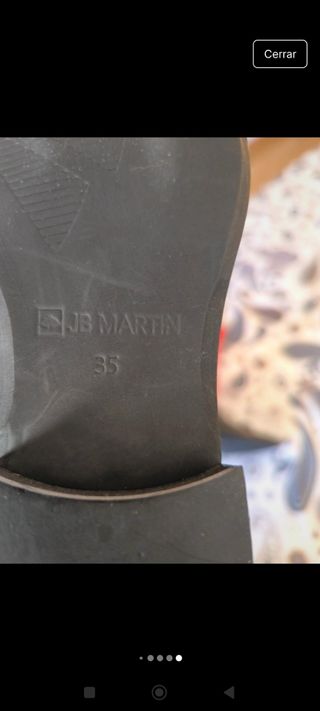 Botas negras altas planas de JB Martin