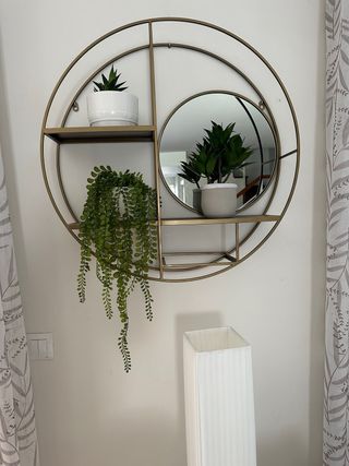 Estanteria metal dorado circular