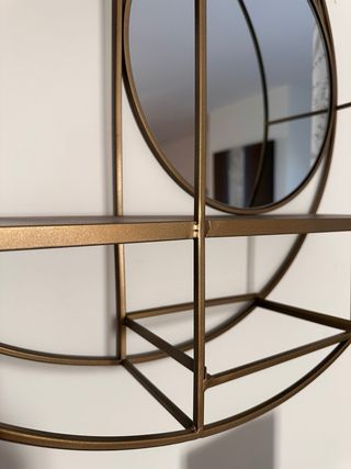 Estanteria metal dorado circular