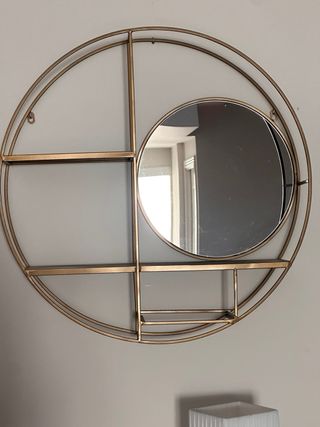 Estanteria metal dorado circular