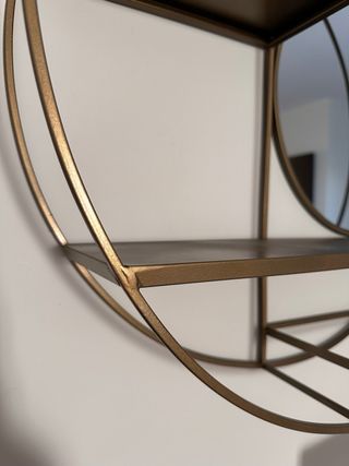 Estanteria metal dorado circular