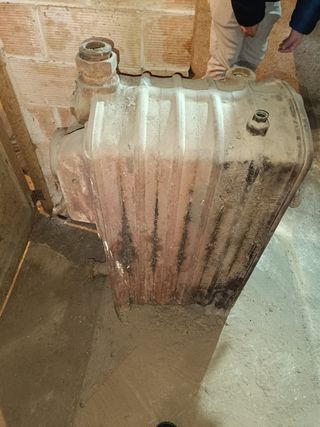 Caldera leña marca roca