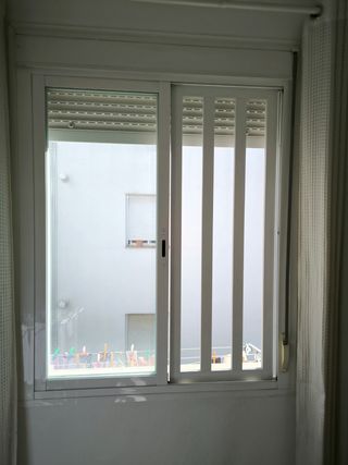 Reja aluminio extraible ventana seguridad