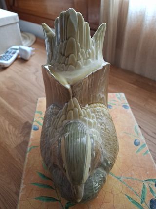 Figura de Lladro, pato reposa libros