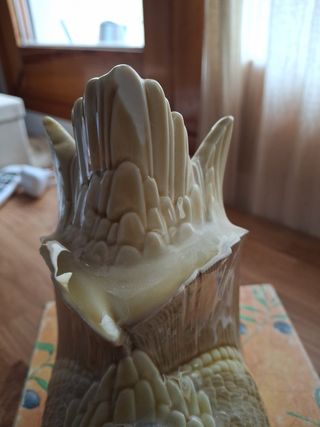 Figura de Lladro, pato reposa libros