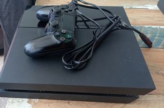 PlayStation 4 500GB mando y juegos