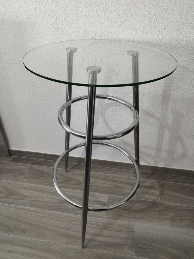 Mesa cristal redonda con patas de inox