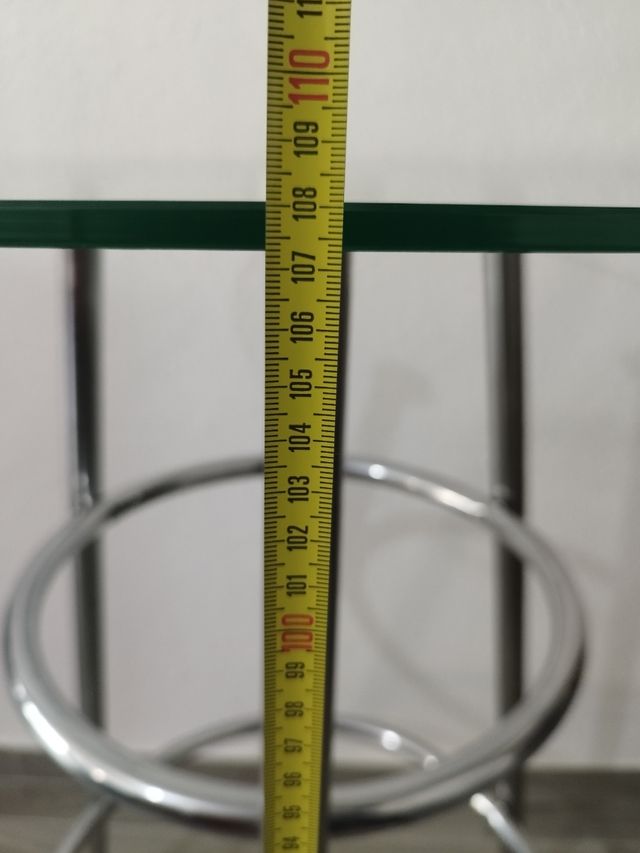 Mesa cristal redonda con patas de inox